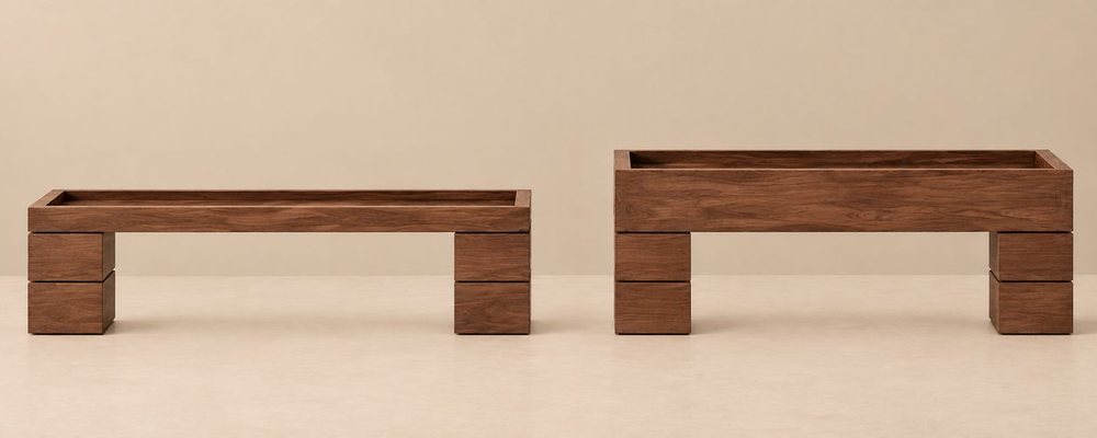 Two timber trays raised on timber bricks